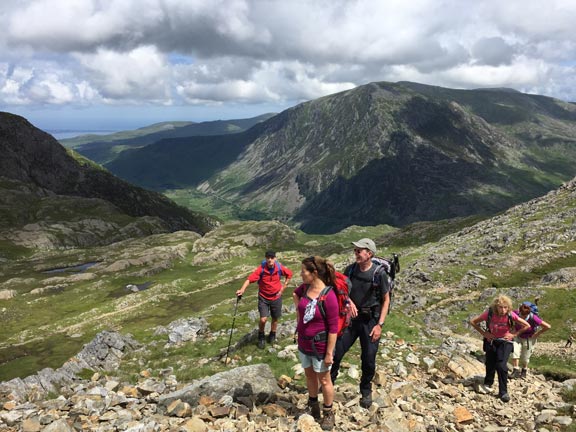 3.Glyders
3/7/16. A quick breather to take in the scenery.  Llyn y Cwn to the left, the top of the Devil's Kitchen behind us and Pen yr Ole Wen in the background. Photo: Heather Stanton.
Keywords: Jul16 Sunday Judith Thomas
