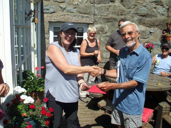 7.Rhiw Coast Path 
19/7/18. Club Secretary presenting Sioned Mair Williams, the St. David's Hospice fundraiser, and organiser of the recent Thursday Abersoch to Plas yn Rhiw charity walk, with a cheque for £455.00.  A further £62.52 has since been collected making a total of £517.52. Photo: Dafydd Williams.
Keywords: Jul18 Thursday Lis Williams