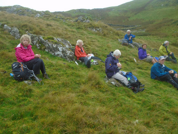 5.Moel Goedog-Bryn Cader Faner, bronze age trail
13/9/20. Lunch out of the cold damp wind at the first sheltered site after visiting the circle of stones. Photo Dafydd Williams.
Keywords: Sep20 Sunday Derek Cosslett