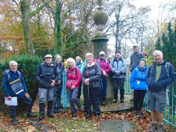 7.Garreg Llanfrothen Circular
18/11/21. Nearly the end of the excellent walk we gather in front of the flaming urn statue which commemorates the restoration of Plas Brondanw after it was badly damaged by fire in 1951 .  There is normally a waterfall behind and below it, but there was no water running. Photo: Dafydd Williams.
Keywords: Nov21 Thursday Dafydd Williams