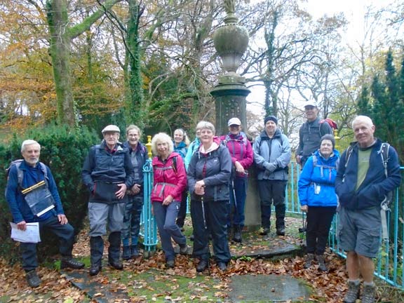 7.Garreg Llanfrothen Circular
18/11/21. Nearly the end of the excellent walk we gather in front of the flaming urn statue which commemorates the restoration of Plas Brondanw after it was badly damaged by fire in 1951 .  There is normally a waterfall behind and below it, but there was no water running. Photo: Dafydd Williams.
Keywords: Nov21 Thursday Dafydd Williams