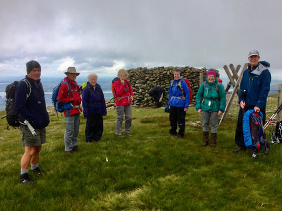 2.Moel Eilio
11/7/21. Nearly ready to leave the summit of Moel Eilio. A quick costume change is necessary; it has started to rain. Photo: Anet Thomas.
Keywords: Jul21 Sunday Hugh Evans