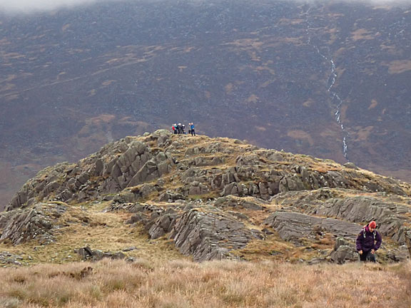 3.Carnedd y Cribau
23/10/22. Most of the group could not resist climbing a lesser peak for practice.  Cefnycerrig. The Glyder range in the background. 
