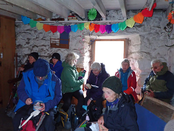 6.Cwm Pennant: Cae Amos - Cwm Ciprwth
4/12/22. Lunch at the Cae Amos bothy.  Seating for all and some birthday decorations thrown in, so to speak.
Keywords: Dec22 Sunday Eryl Thomas