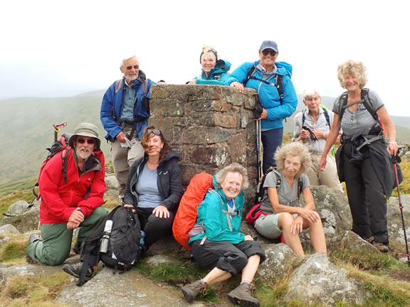 6.Tal-y-Fan
24/7/22. Final after a lot of climbing the summit of Tal-y-Fan.  The effects of the high wind can be seen on the various hair styles.
Keywords: Jul22 Sunday Gwynfor Jones
