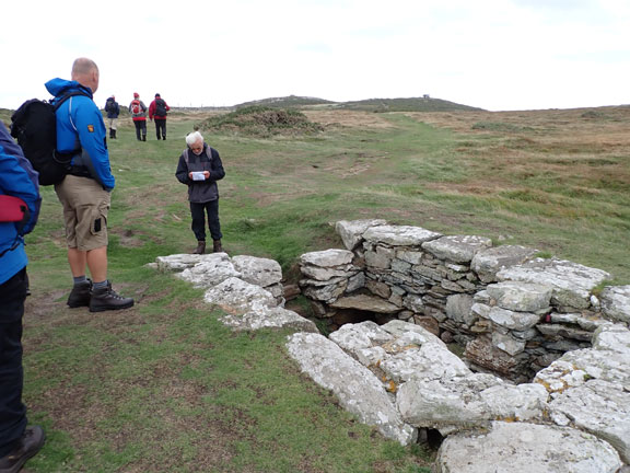 5.Trearddur Bay - Pontrhydybont
9/10/22. Saint Gwenfaen's Well. The Castguard Lookout Station, the site of our tea/coffee break, can be seen on top of the right hand hill. 
Keywords: Oct22 Sunday Gwynfor Jones