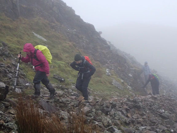 3.Cnicht
15/1/23. About 1.5 miles from start. The path crosses a scree. Visibility is getting worse. 
Keywords: Jan23 Sunday Gareth Hughes