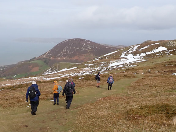 4.Penmaenmawr
12/3/23. Soon after lunch, close to the Druid's Circle, we are making our way east to  Foel Lûs, which can be seen in the background.
Keywords: Mar23 Sunday Jean Norton Annie Andrew