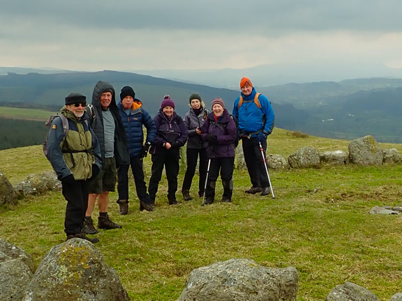 7. Llandrillo - Bwlch Maen Gwynedd.
25/2/24. Standing in the stone circle at the top of Moel Ty Uchaf. No UFO's in sight. Mynydd Mynyllod is behind the group.
Keywords: Feb24 Sunday Eryl Thomas