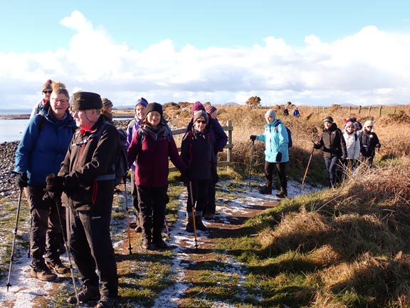 3.Llanystumdwy Circular
18/1/24. Still on the Wales Coast Path just south of Ynysgain Fawr a brief stop to admire the snow capped mountains of Eryri and Meirionydd. 
Keywords: Jan24 Thursday Dafydd Williams