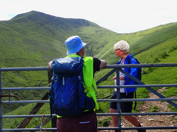 9.Maesglase, Maen Du & Craig Rhiw-erch
2/6/24. Nearly at the mouth of Nant Maesglase below Moel Cwm yr Eglwys. Close to the end of the walk. The leader checks that all is well.
Keywords: Jun24 Sunday Adrian Thomas