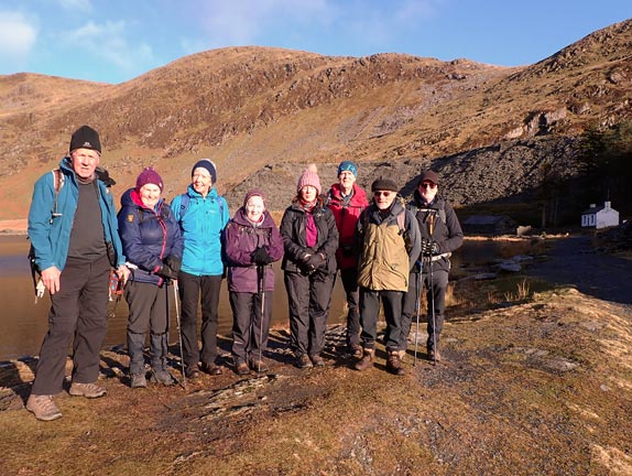 1. Tanygrisiau - Moelwynion
After climbing up from Tanygrisiau the group photograph was taken at the south end of Llyn Cwmorthin. In the background Allt y Cyffylau and Allt Mawr. The white painted house on the far right of the picture was the quarry manager's house.
Keywords: Jan25 Saturday Gareth Hughes