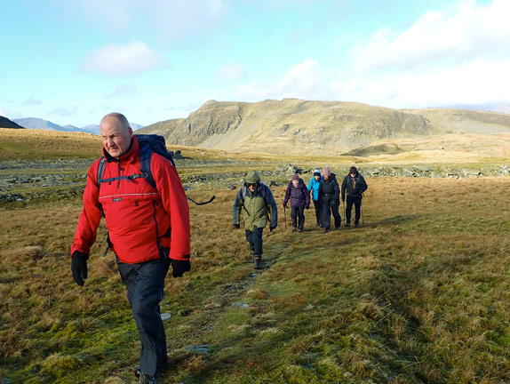 3. Tanygrisiau - Moelwynion
Flat and easy going between Moel-y-Hydd, out of sight on the right of the photo, and Moelwyn Mawr, out of sight on the left of the photo. The group split in to two a bit further on with one group climbing the summits of Moelwyn Mawr and Moelwyn Bach, and the other group doing a traversing along the side of Moelwyn Mawr along to Bwlch Stwlan.
Keywords: Jan25 Saturday Gareth Hughes