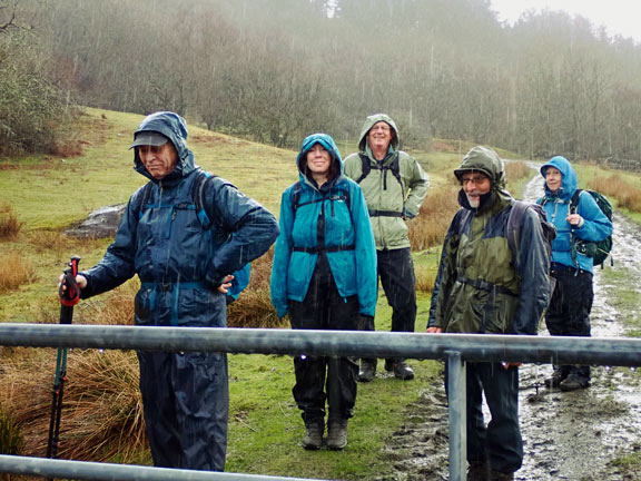 7. Dolwyddelan - Ty Mawr Wybrnant circ
8/2/26. Just about to join our outgoing path, 0.25 miles from the end of the walk. Still smiling despite the rain.
Keywords: Feb26 Sunday Gwynfor Jones