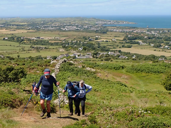 7. Parys Mountain - Mynydd Eilian
28/6/26. Nearly at the top of Mynydd Eilian. Views over Amlwch to Bull Bay are in the background.
Keywords: Jun26 Sunday Noel Davey