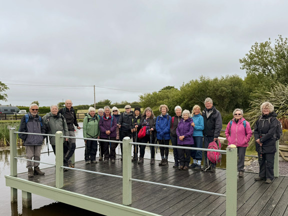 4. Nefyn - Duck Pond
21/5/26. Group photograph at the Duck Pond. It looks strong enough to hold us all, even after lunch. Photo: Judith Thomas.
Keywords: May26 Thursday Miriam Heald