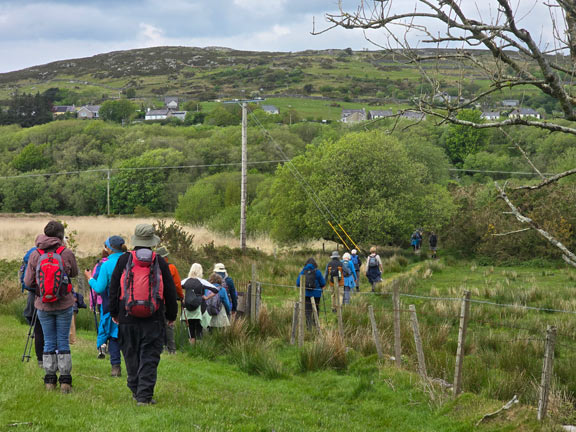 9. Talysarn-Tanyrallt
7/5/26. The last section of the walk. Approaching Talysarn from the south. The hill Clogwyn Melyn in the background with Talysarn at the base of it behind the trees.
Keywords: May26 Thursday Colin Higgs