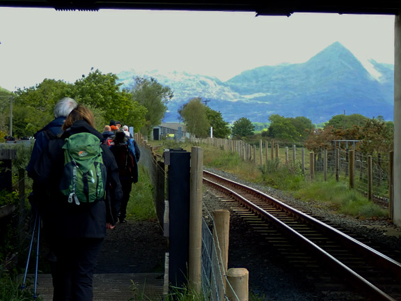 2. Tremadog Hills
17/5/26. Picture framed by the bridge over which the Porthmadog By-pass travels, as we walk alongside the Welsh Highland Railway. Cnicht in the background.
Keywords: May26 Sunday Eryl Thomas