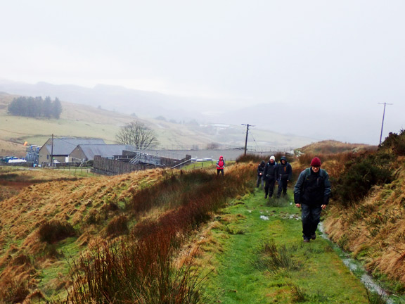 5. Cwm Cynfal - Bryn y Castell - Llyn Morwynion
29/12/2024. Approaching Craig y Garreg-lwyd with the Dwr Cymru water treatment plant in the background.
Keywords: Dec24 Sunday Noel Davey