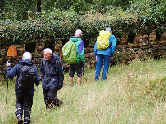 8. Ganllwyd - Penrhos Isaf
25/08/24. Exploring the grounds of Dolmelynllyn and finding a wall with openings in it called bee boles, for wicker bee hives. One hive can be seen in the opening second from the right.
Keywords: Aug24 Sunday Eryl Thomas