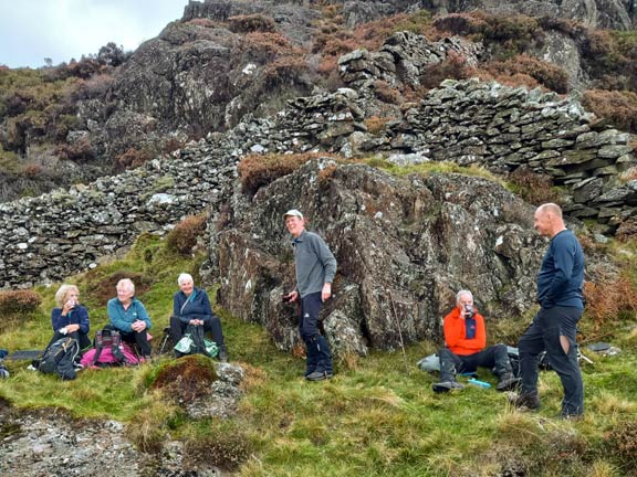 3. Yr Aran
18/10/25. A stop for a panad about 1/3rd the way up Cwm y Hyrddod at a sheep fold. We were fairly well sheltered from the wind. Photo: Eryl Thomas.
Keywords: Oct25 Saturday Eryl Thomas