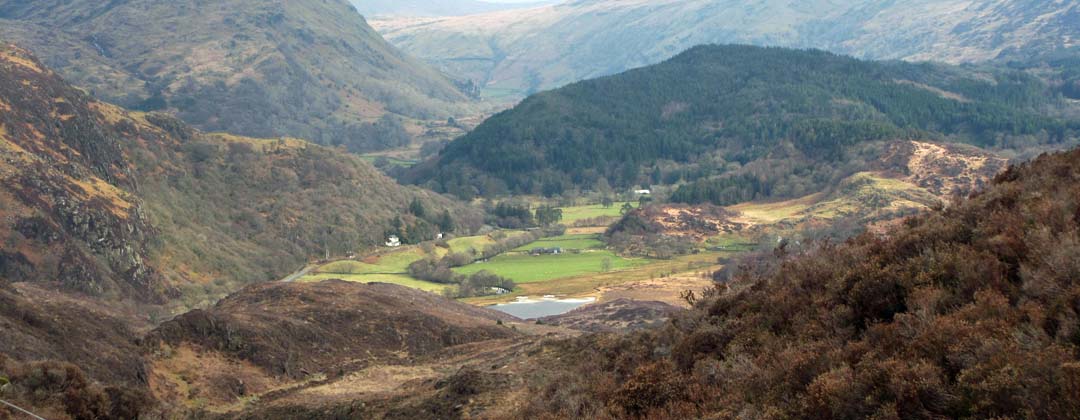 Looking north from Cwm Bychan, Beddgelert down at Afon Glaslyn with the tip of Llyn Dinas showing.
