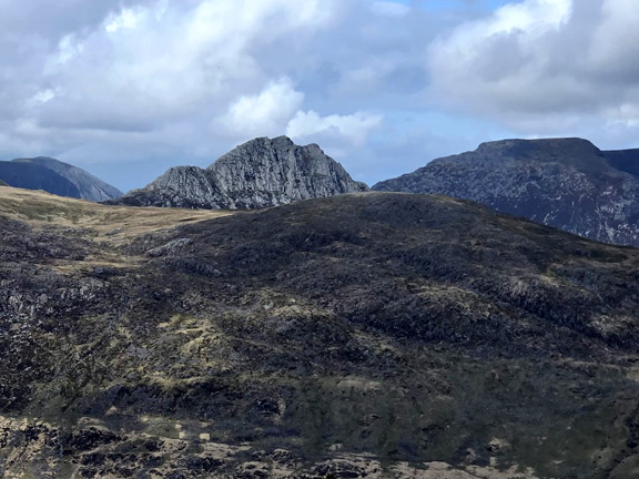 6. Moel Siabod (A group)
19/04/26. From the summit facing NW. Tryfan, centre background, Carnedd Dafydd, right background. Photo: Mags McQuilling Jones.
Keywords: Apr26 Sunday Gareth Hughes