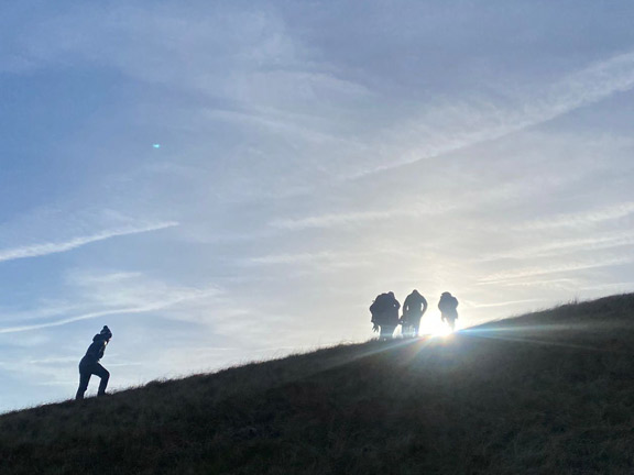 5. Llanaelhaearn - Pen-y-Gaer - Moel Bronmiod
28/12/25. "The struggle". Making our way up Moel Bronmiod. Photograph taken into the sun to get the effect required.  Photo: Sally Kettle.
Keywords: Dec25 Sunday Noel Davey
