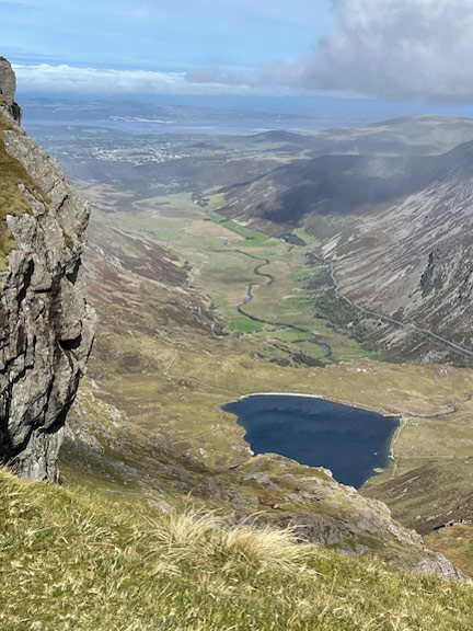 4. The Glyders Red Dot Route
4/10/26. From Glyder Fawr looking down at Llyn Ogwen, the Nant Ffrancon Valley, and over the Menai Strait to Anglesey.  Photo: Noel Davey.
Keywords: Oct26 Sunday Selina Thomas